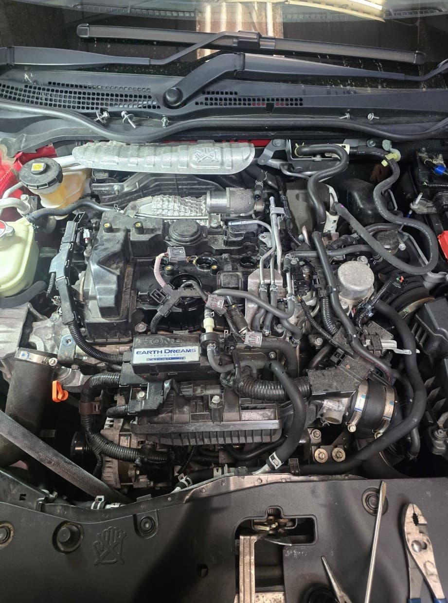 Mechanic working on a car