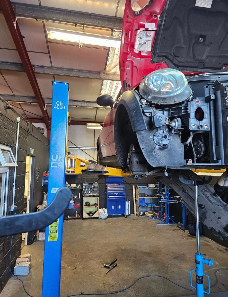 Mechanic working on a car